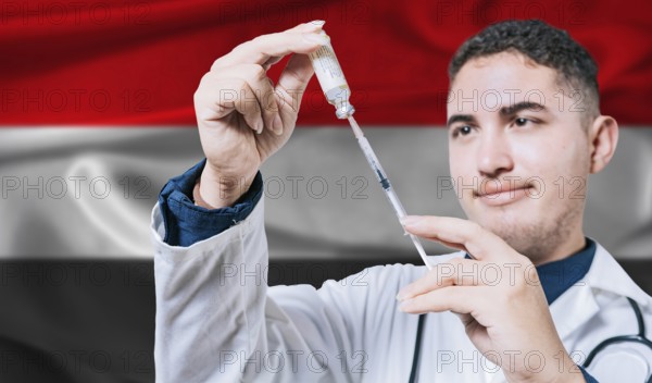 Doctor holding syringe on Yemen flag background. Medical professional holding syringe with Yemeni flag in the background