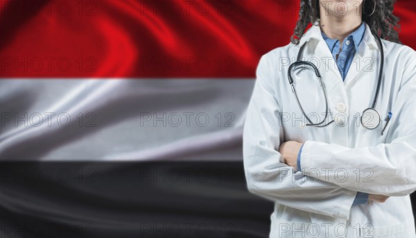 Medical professional on Yemen flag. Healthcare and wellness in Yemen, Concept