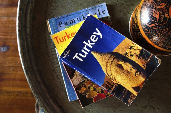 Selcuk, Turkey July 1st 2015 A travel lifestyle selection of guidebooks to Turkey in a holiday cottage in the Turkish city of Selcuk