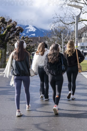 Young woman running, Interlaken, Switzerland