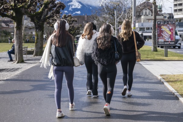 Young woman running, Interlaken, Switzerland