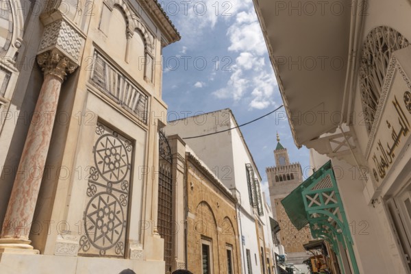 Scenic view of the minaret of Al-Zaytuna Mosque in the Medina, the oldest mosque in the Tunisian capital, Tunis. North Africa