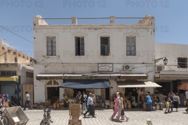 Tunisian shopping in the market of Sfax Medina, Tunisia, North Africa