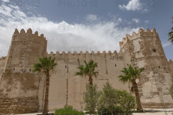 Tower and details of the ancient city walls of the medieval Medina of Sfax on the Mediterranean coast of Tunisia, North Africa