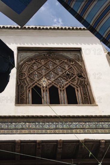 Architectural detailed ornate design of a typical wooden window in the Medina of Tunis, a UNESCO designated quarter of the Tunisian capital, Tunisia, North Africa