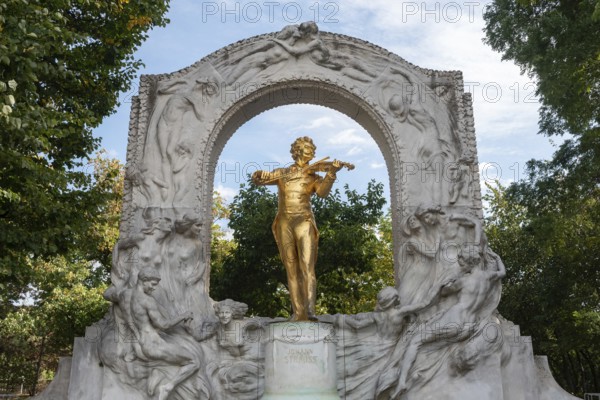 Vienna, Austria. October 5th 2023 The golden statue of Johann Strauss Jr in the Stadtpark, part of a montage of Viennese landmarks setting the scene for the movie The Third Man, Vienna, Austria