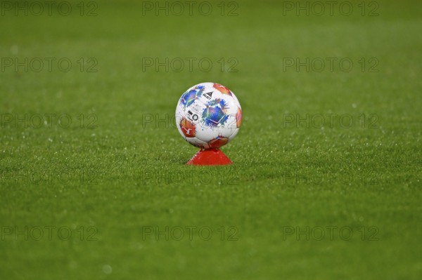 Adidas derby star game ball on hat, marker cap, on grass, soccer Bundesliga, Voith-Arena, Heidenheim, Baden-Württemberg, Germany