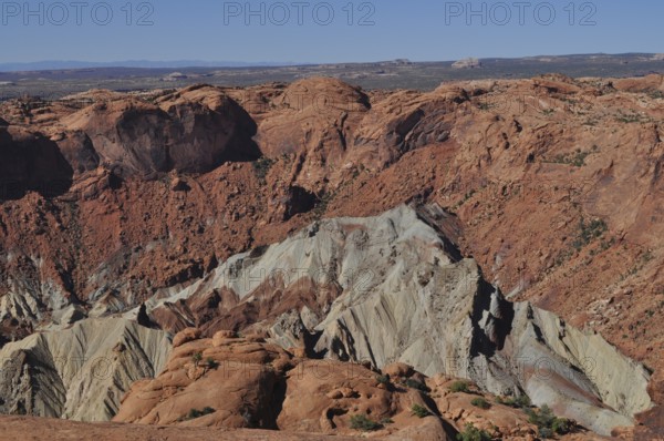 View of impressive red rock formations in a deep canyon, Canyonlands National Park, Island in the Sky, Utah, USA