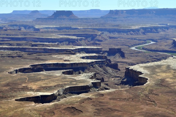 Sublime canyon landscape with river, formed by erosion, under clear sky, Canyonlands National Park, Island in the Sky, Utah, USA