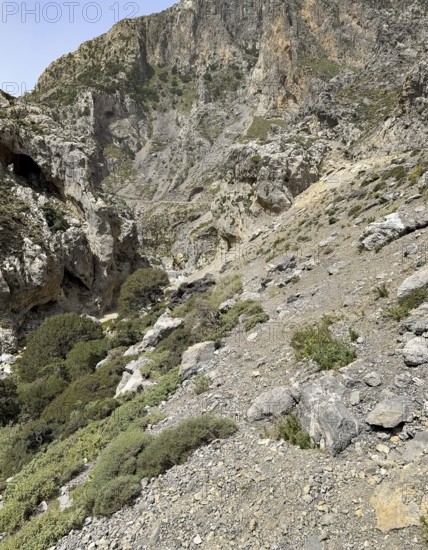 Erosion on rocky rocky mountainsides of eroded rocks with risk of rockfall landslide, international