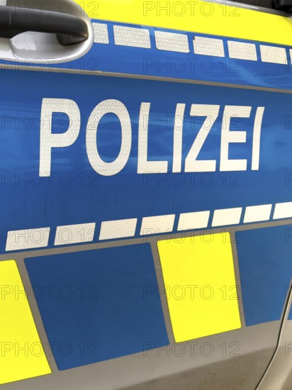 Large police lettering on police car police car emergency vehicle patrol car, Germany