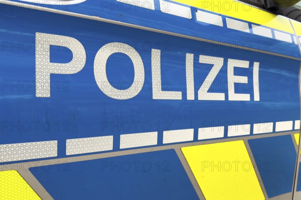 Large police lettering on police car police car emergency vehicle patrol car, Germany