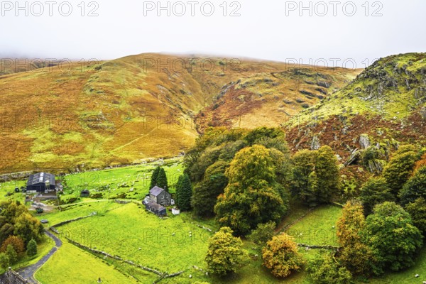 Autumn colors over Claerwen Dam, Claerwen Valley, Elan Valley Reservoir, Rhayader, Powys, Wales, UK