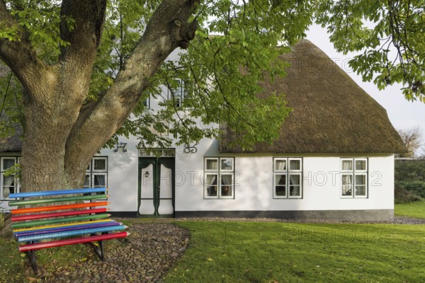 Colored pencil bench in front of Friesenhaus Sylt Germany