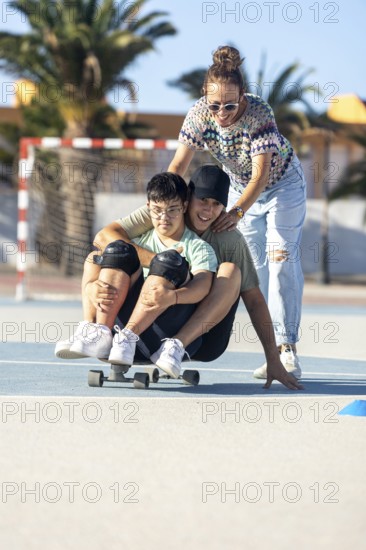 A Down syndrome teenager enjoys outdoor skateboarding with family support Laughter and joy fill the air as they embrace the spirit of togetherness and fun