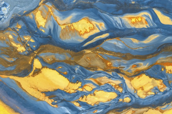 This image captures a stunning blend of swirling blue and gold hues, creating an abstract texture The harmonious flow evokes movement and depth, perfect for creative projects
