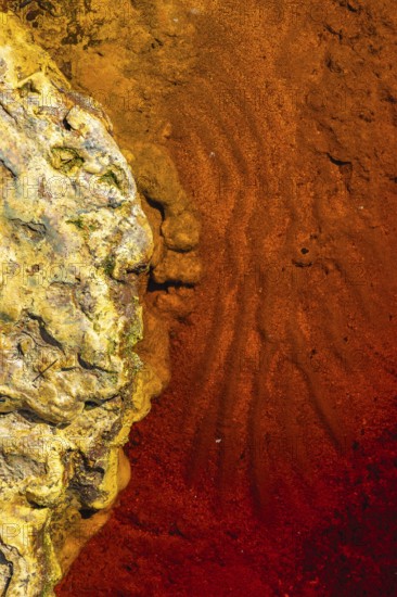 The image showcases the vivid and striking colors of Riotinto River in Huelva, Spain The unique mineral composition creates a mesmerizing blend of red and orange hues