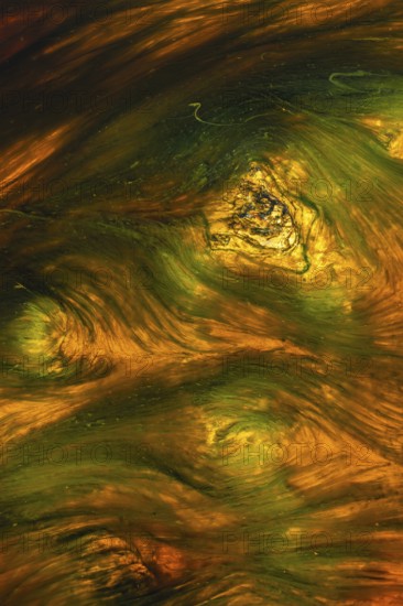 A stunning abstract of Riotinto river in Huelva, Spain, showcasing vivid orange and green hues The unique mineral-rich waters create a mesmerizing landscape