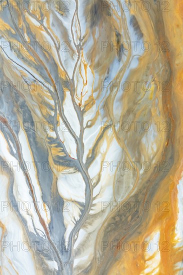 A vibrant abstract image featuring intertwining flows of earthy orange, gray, and white tones The combination creates an intricate and dynamic visual texture, resembling natural patterns