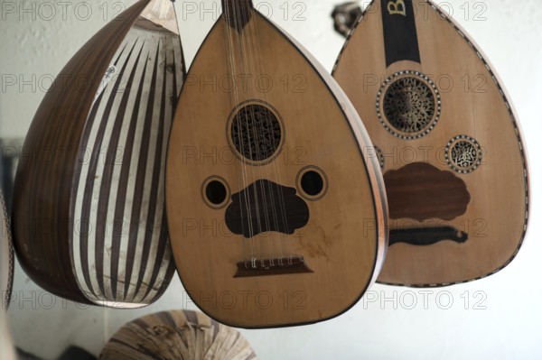Istanbul, Turkey. April 13th 2017 Handmade Oud hanging inside the window display of Veysel Muzik Evi, Istanbul. Produced by Cengiz Sarikus