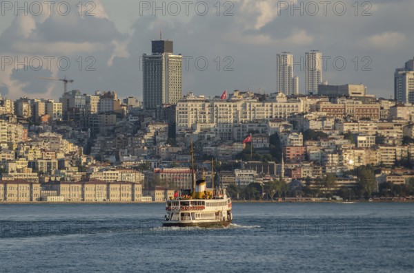 Istanbul, Turkey. August 19th 2014 A ferry crosses the Bosphorus towards Besiktas on the European side of Istanbul, Turkey