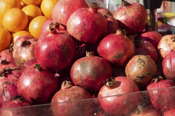 Brightly colored Pomegranates are juicy, sweet fruits with edible seeds called arils inside. A seasonal fruit they're rich in fiber, vitamins, and minerals, full of antioxidants and anti-inflammatory compounds such as punicalagins