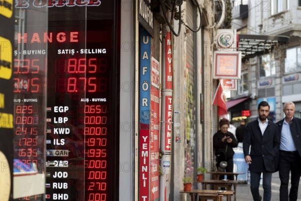 Istanbul, Turkey. November 10th 2022 Turkish Lira against other currency exchange rates displayed in a shop window in the Taksim neighbourhood of central Istanbul, Turkey