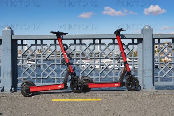 Istanbul, Turkey. October 5th 2021 Environmentally friendly red electric scooters parked on the Galata Bridge on the European side of Istanbul, Turkey