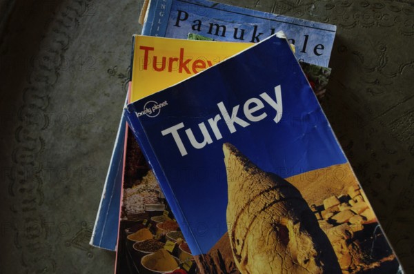 Selcuk, Turkey July 1st 2015 A selection of guide books to Turkey on an ornamental table