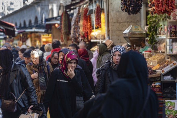 Istanbul, Turkey. November 21st 2023 A crowded bazaar with Turkish women shopping in a local Istanbul neighbourhood during an economic crisis with rising inflation and currency fluctuations. Turkey