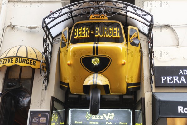 August 2nd 2021 Istanbul, Turkey Quirky Yellow Sign for Jazz Ve Beer and Burger Bar near Istiklal Street, Taksim, Istanbul, Turkey