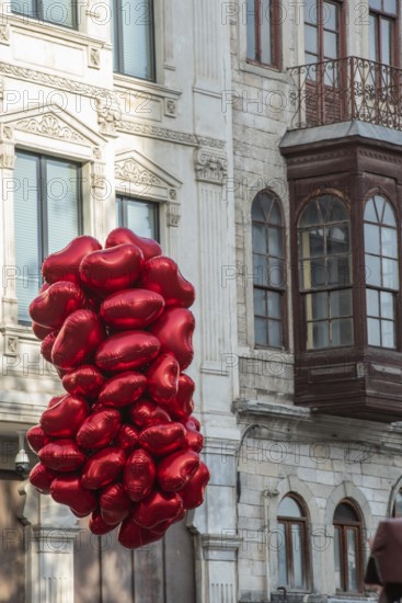 Istanbul, Turkey. November 29th 2020 Red heart shaped Valentines balloons hanging for sale in the Beyoglu district of Istanbul, Turkey