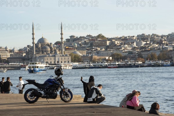 Istanbul, Turkey. November 14th 2023 View of Yeni Cami, New Mosque from the Halic ferry port at Karikoy on the Golden Horn, on the European side of Istanbul, Turkey
