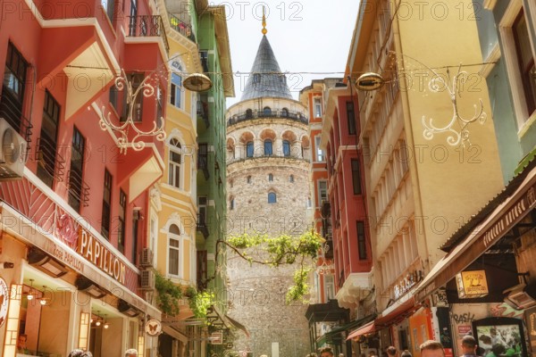 Istanbul, Turkey. May 17th 2022 The iconic Galata Tower in the trendy Pera District, a popular tourist destination with cool street side cafes and restaurants, Istanbul, Turkey