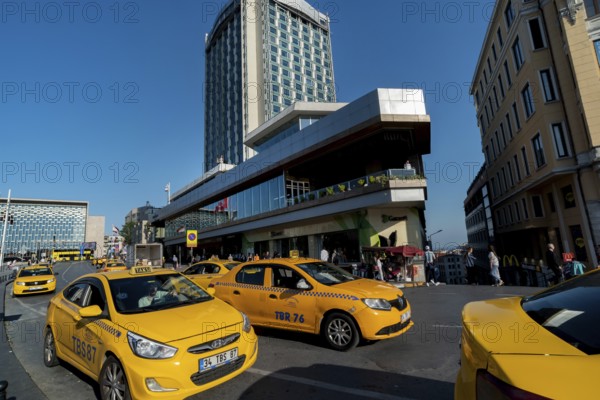 Istanbul, Turkey. June 13th 2022 Turkish taxi service in Taksim square at the beginning of Istiklal Street, popular with tourists shopping and sightseeing