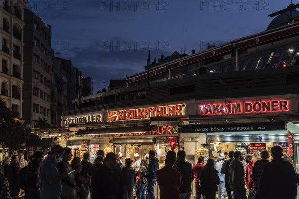 Istanbul Turkey. October 18th 2021 One of the most popular places to eat Doner Kebab at night in Istanbul, Taksim Square take-away kebab Restaurants busy with locals and tourists alike