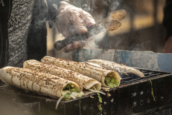 Istanbul, Turkey. November 29th 2020 Grilled fish wrap sandwiches cooking on a stall outside in Karakoy, Istanbul, Turkey