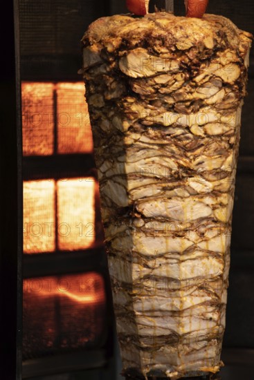 Istanbul, Turkey. November 30th 2020 Layers of Turkish Kebab meat cooking on a skewer in Istiklal Street, Istanbul, Turkey
