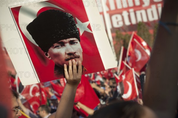 Taksim Square, Istanbul, Turkey. July 24th 2016 Portraits of Atatürk among Turkish flag waving supporters after the Akp government prevented an attempted coup