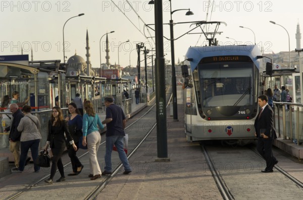 Istanbul, Turkey. April 25th 2012 Turkish commuters at Karakoy tram station, near the Galata Bridge on the European side of Istanbul, Turkey