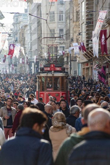 Istanbul, Turkey. November 30th 2019 A traditional Turkish tram along a crowded Istiklal street, Istanbul. Turkey