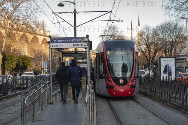 Istanbul, Turkey. December 25th 2021 Commuters catching a tram at Tophane station near Karakoy on the European side of Istanbul, Turkey