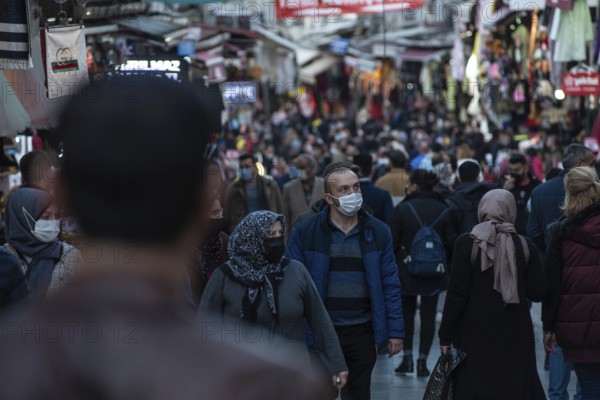 Istanbul, Turkey. November 28th 2020 Shoppers wearing face masks in a crowded Bazaar on the European side of Istanbul, Turkey