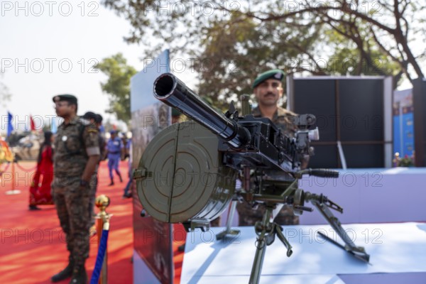 A heavy machine gun mounted on a tripod is displayed during a weapon exhibition by the Central Reserve Police Force at the 87th Raising Day celebrations, on February 19, 2026 in Guwahati, India