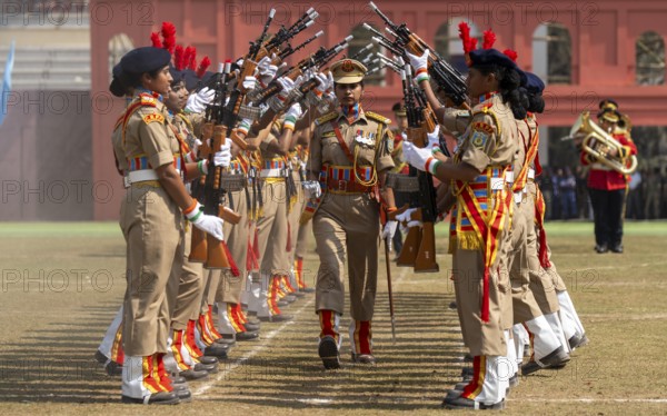 Women personnel of the Central Reserve Police Force (CRPF) perform a synchronised rifle drill during a parade held as part of the 87th Raising Day celebrations, on February 19, 2026 in Guwahati, India