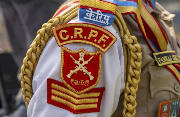 The ceremonial insignia and braided cord on the uniform of a personnel of the Central Reserve Police Force (CRPF) during the 87th Raising Day parade, on February 19, 2026 in Guwahati, India