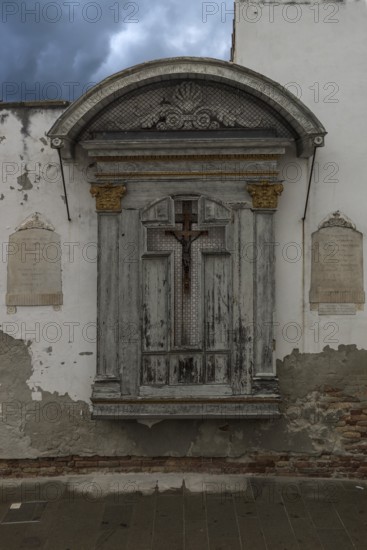 Sacred shrine on a house wall, Venice, Veneto, Italy