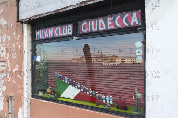 Reflection of Venice in the window of the Milan soccer club on the island of Giudecca, Veneto, Italy