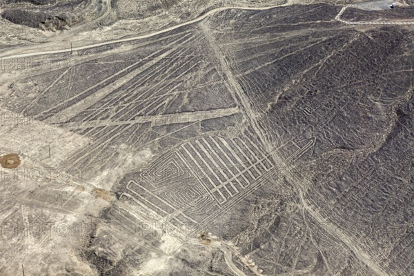 Desert plains with geometric Nazca lines photographed from the air in Peru, The geoglyphs and images in the desert near Nasca and Palpa in Peru
