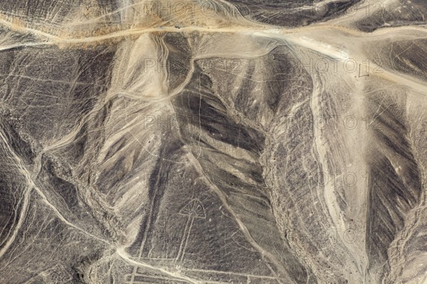 Geoglyphs and line patterns in the sandy and rocky landscape of Nazca, The geoglyphs and drawings in the desert near Nasca and Palpa in Peru